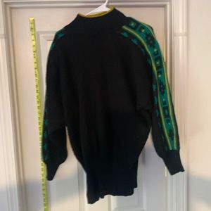 Vintage turtle neck with a southwest tribal design on the sleeves